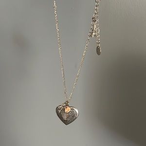 Heart shaped metal locket necklace